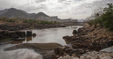 The Blue Nile flows as the under-construction Grand Ethiopian Renaissance Dam stands beyond in the Benishangul-Gumuz Region of Ethiopia, May 22, 2019. (Getty Images)