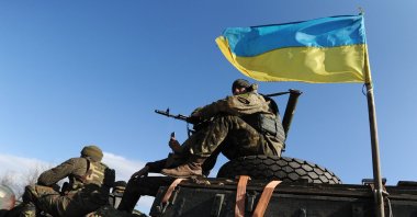  Soldiers in the Ukrainian Army withdraw 15, 100 mm caliber artillery guns in Soledar, eastern Ukraine, on Feb. 27, 2015. (Photo by Scott Peterson/Getty Images)