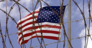 A U.S. flag flies at Camp V inside Camp Delta at the U.S. Naval Station in Guantanamo Bay, Cuba, April 24, 2007. (AFP File Photo)