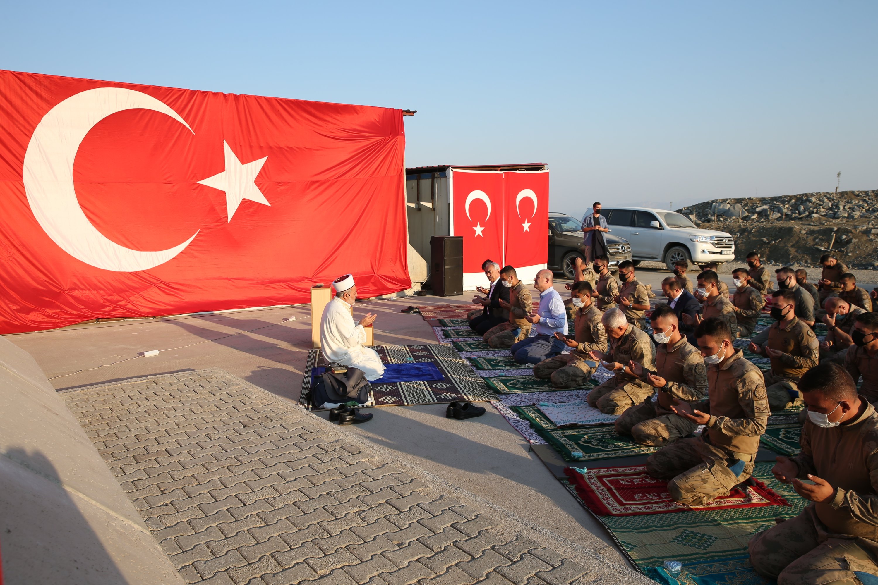 Interior Minister Süleyman Soylu (1st row, 3rd from top) perform bayram prayers during the first day of Qurban Bayram, or Eid al-Adha, at a gendarmerie command post in Şırnak, Turkey, July 20, 2021. (AA Photo)