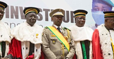 Interim Malian President, Colonel Assimi Goita (C), stands with members of the Supreme Court during his swearing in ceremony in Bamako, Mali, June 7, 2021. (AFP Photo)