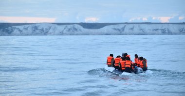 Migrants in a dinghy sail in the Channel toward the south coast of England after crossing from France, Sept. 1, 2020. (AFP Photo)