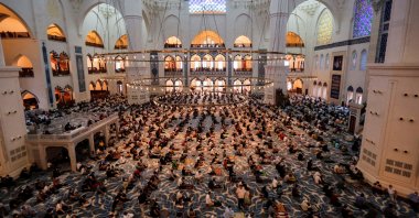 Worshippers attend prayers marking the Islamic holiday Eid al-Adha at Grand Camlica Mosque in Istanbul, Turkey, July 20, 2021. (Reuters Photo)