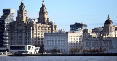 Buildings on Liverpool's waterfront, including the Liver Building, are pictured across the River Mersey, Liverpool, Britain, Oct. 12, 2020. (AFP Photo)