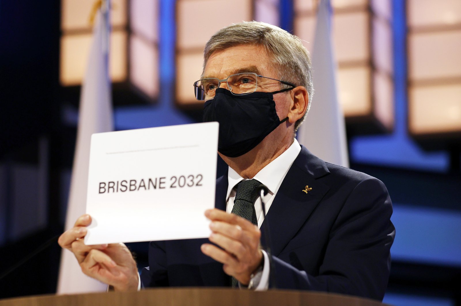 President of the International Olympic Committee Thomas Bach announces Brisbane as the 2032 Summer Olympics host city during the 138th IOC Session in Tokyo, Japan, July 21, 2021. (AP Photo)