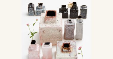 In this image provided by  ABC Carpet & Home, ceramicist Bjarni Sigurdsson has crafted his Volcano Ash Cloud vase collection using ash from Eyjafjallajokull, which erupted in Iceland in 2010. ( ABC Carpet & Home via AP)