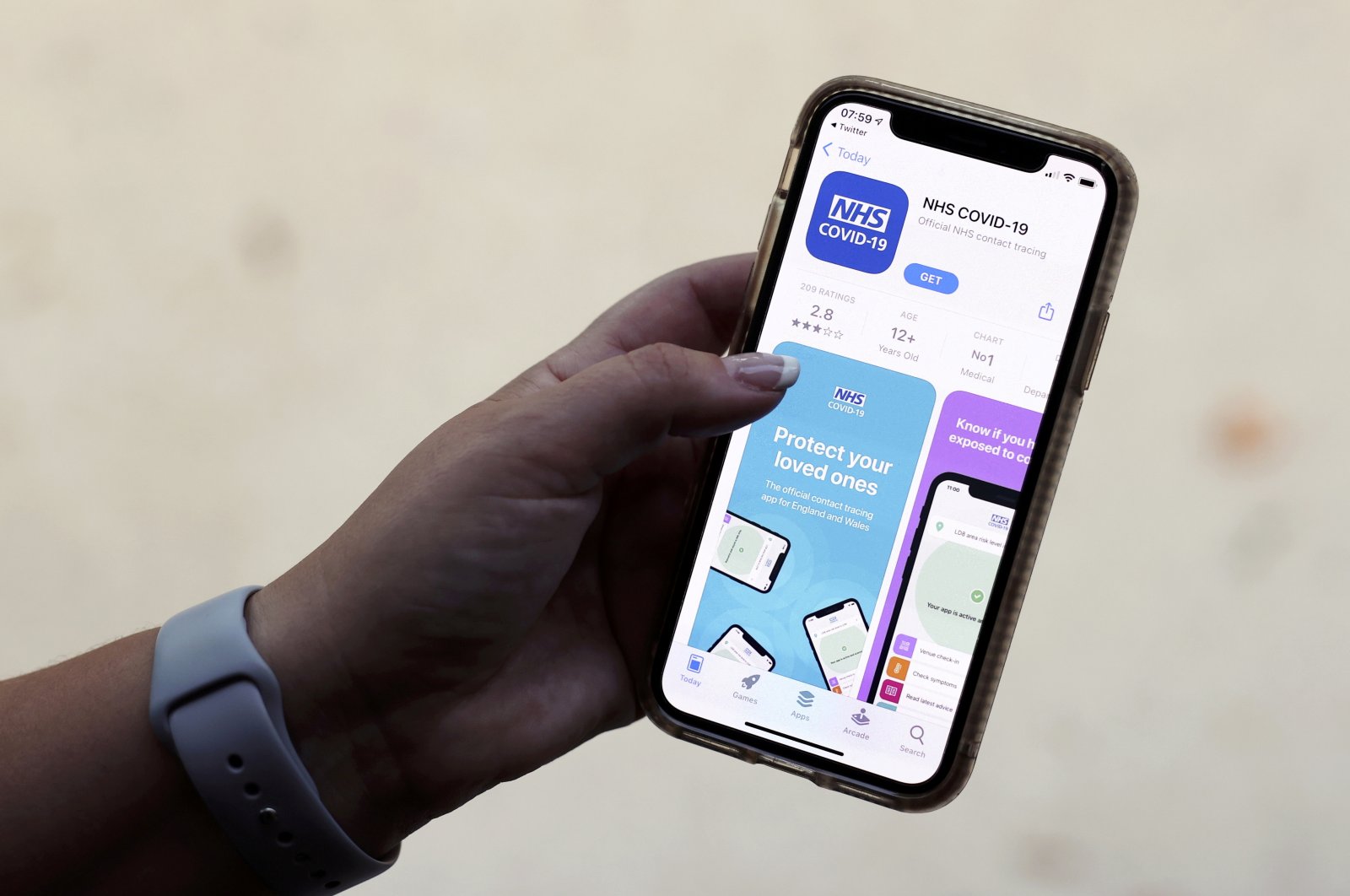 The coronavirus contact tracing smartphone app of Britain's National Health Service (NHS) is displayed on an iPhone in this illustration photograph taken in Keele, Britain, Sept. 24, 2020. (Reuters Photo)