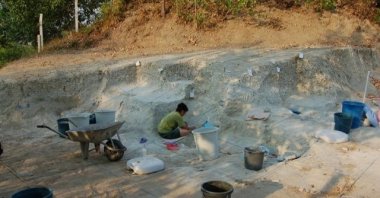 Archaeologists work at the site, in Mustafakemalpaşa, Bursa province, Turkey, July 22, 2021. (IHA Photo)