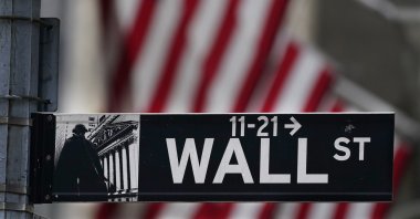 A street sign is displayed at the New York Stock Exchange in New York, N.Y., U.S., Nov. 23, 2020. (AP Photo)