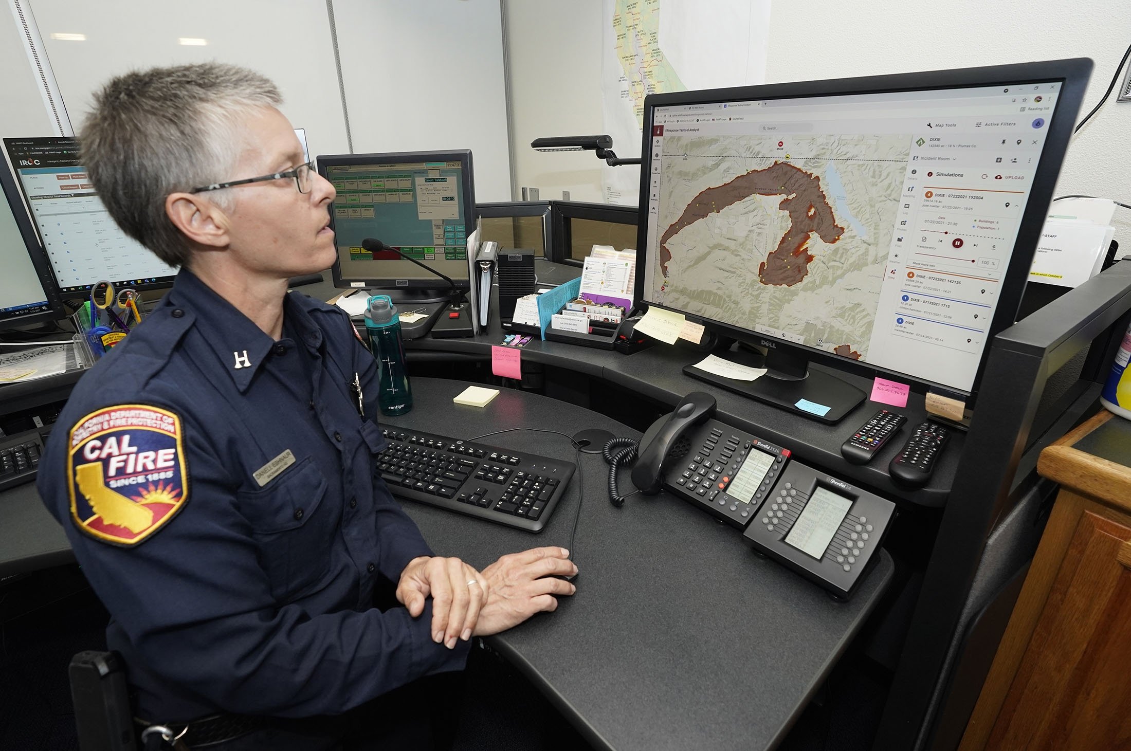 California Fire Captain Danell Eshnaur uses the Fire Response Tactical Analyst program at the California Department of Forestry and Fire Protection's Sacramento Command Center in California, U.S., July 23, 2021. (AP Photo)