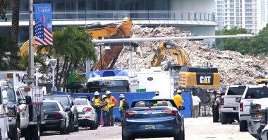 Crews work in the rubble of the Champlain Towers South building, as removal and recovery work continues at the site of the partially collapsed condo building in Surfside, Florida, U.S., July 13, 2021. (AP Photo)