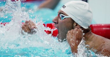 Tunisia's Ahmed Hafnaoui reacts after winning gold in Tokyo 2020 Olympics Men's 400-meter Freestyle, Tokyo, Japan - July 25, 2021. 