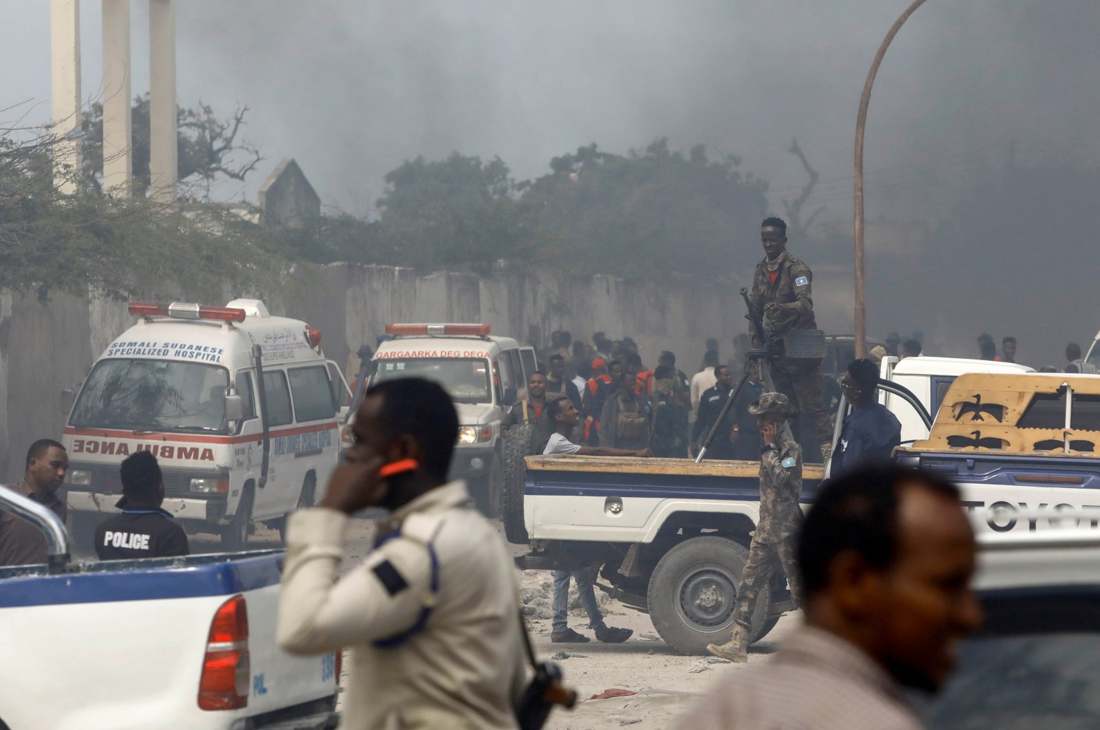 A general view shows security officers and rescuers at the scene of a car explosion near Banadir hospital in Mogadishu, Somalia, July 10, 2021. (Reuters Photo)