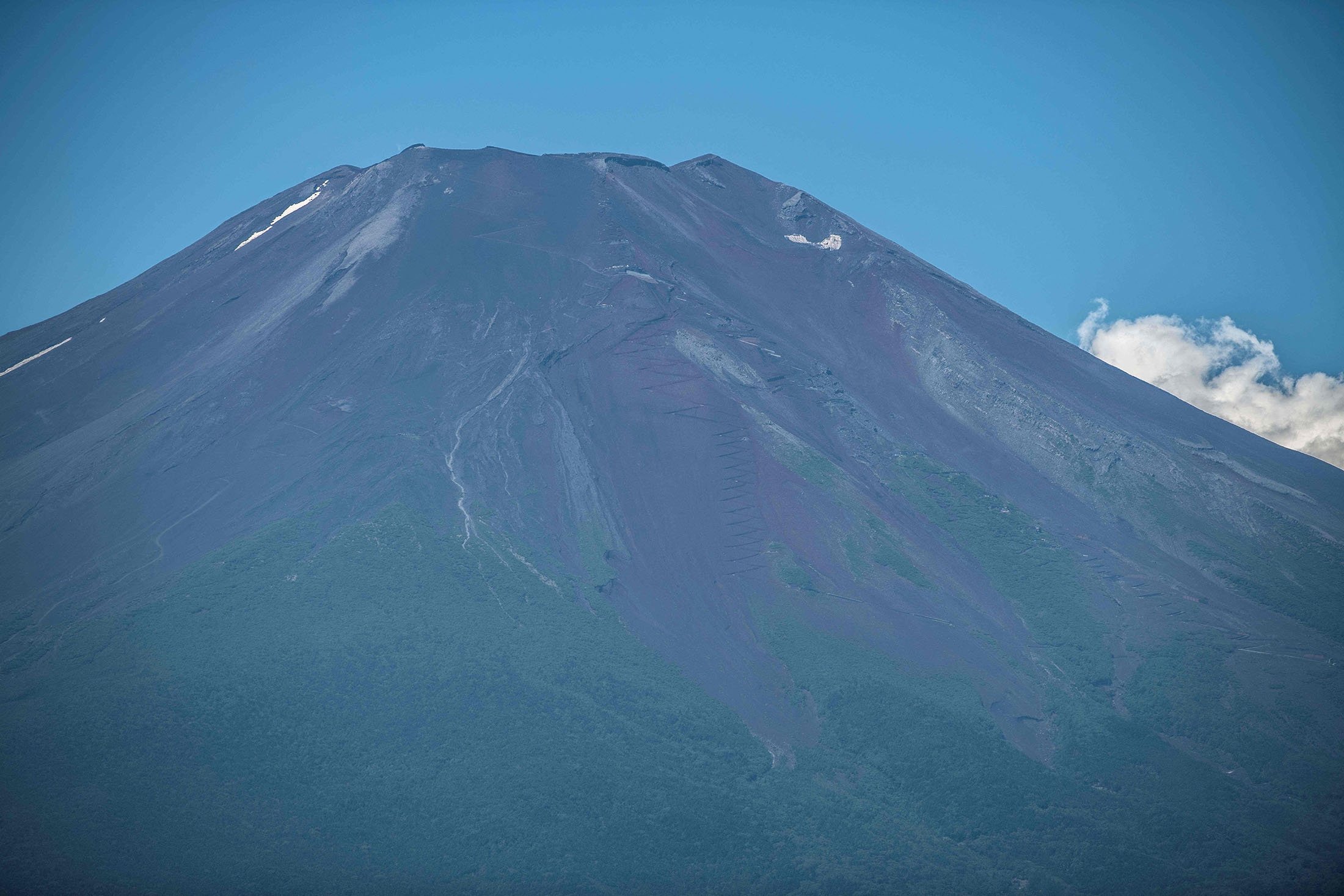 Part of the trail zigzagging on the side of Mount Fuji can be seen, some 70 kilometers (43 miles) west of the capital Tokyo, Japan, July 19, 2021. (AFP Photo)
