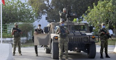 Tunisian soldiers cordon off the parliament building in the capital Tunis on July 26, 2021, following a move by the President to suspend the country's parliament and dismiss the Prime Minister. (AFP Photo)