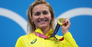 Australia's Ariarne Titmus poses with the 400-meter freestyle Tokyo 2020 Olympics gold medal at the Tokyo Aquatics Centre, Tokyo, Japan, July 26, 2021.