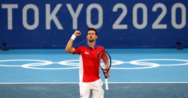 Serbia's Novak Djokovic celebrates after winning his Tokyo 2020 Olympics Tennis Men's Singles second-round match against Germany's Jan-Lennard Struff, Ariake Tennis Park, Tokyo, Japan, July 26, 2021.
