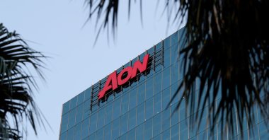 An office building with the Aon logo is seen in the Central Business District of Sydney, Australia, June 3, 2020. (Reuters Photo)
