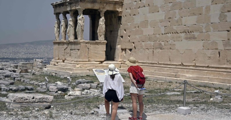 Tourists visit the Ancient Acropolis archeological site in Athens, Greece, July 1, 2021. (AFP Photo)