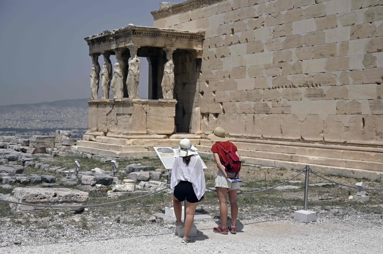 Tourists visit the Ancient Acropolis archeological site in Athens, Greece, July 1, 2021. (AFP Photo)