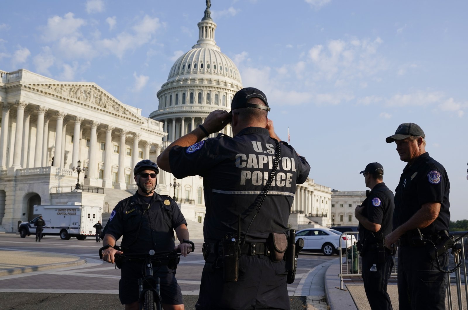 The U.S. Capitol is seen in Washington, early Tuesday as U.S. Capitol Police watch the perimeter, Washington, U.S., July 27, 2021. (AP Photo)