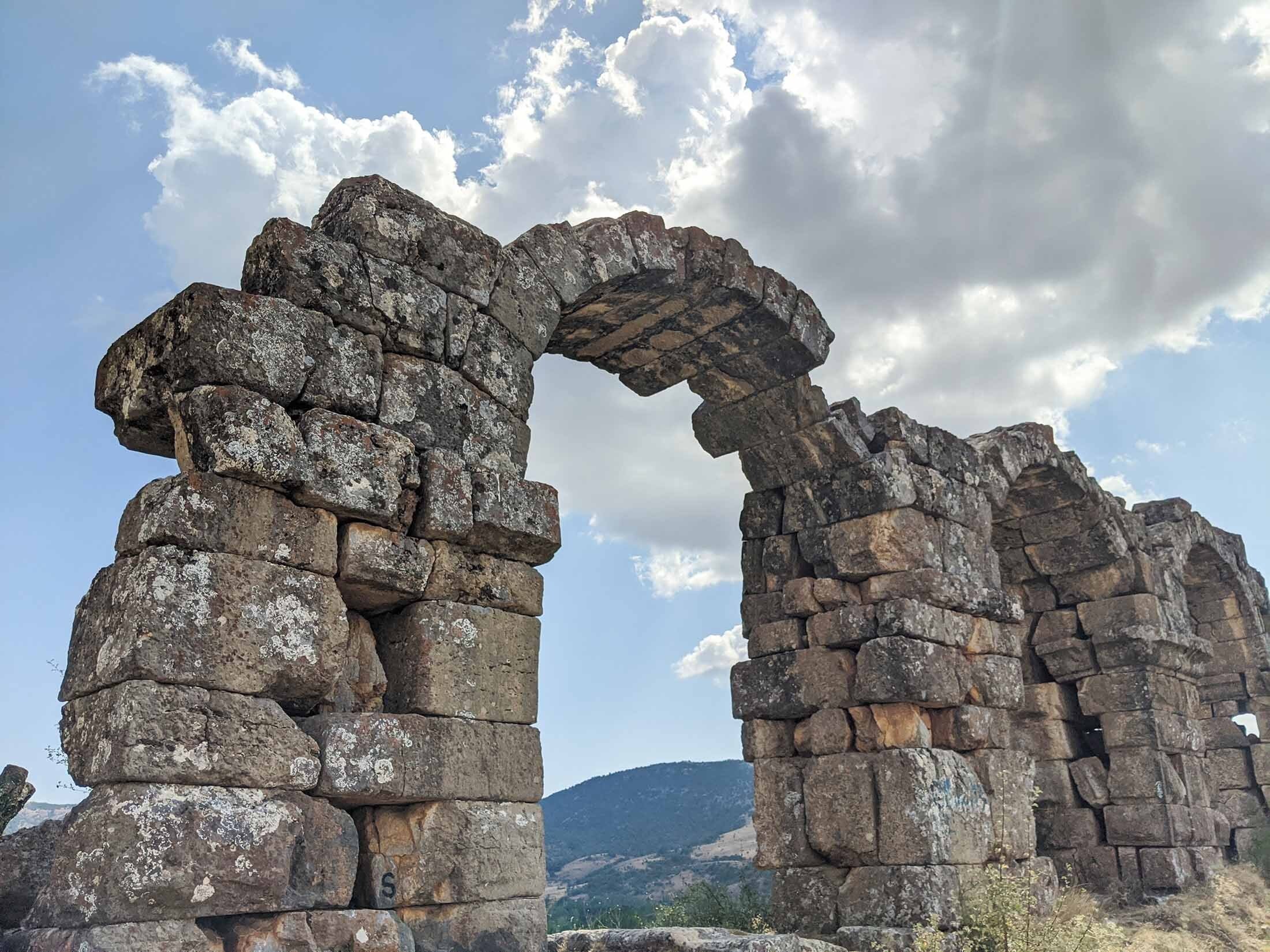 An ancient Roman aqueduct leading to the city of Antioch built by Emperor Trajan in the 2nd century A.D., stands outside modern-day Hatay, Turkey. (Shutterstock Photo)