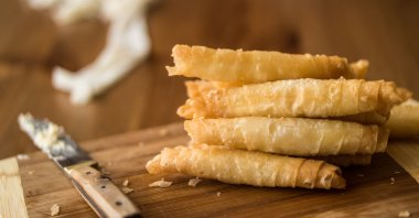 Turkish cigar-shaped "börek," a type of layered pastry traditionally filled with cheese or meat. (Shutterstock Photo)