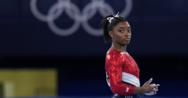 Simone Biles, of the United States, waits to perform on the vault during the artistic gymnastics women's final at the 2020 Summer Olympics, Tokyo, Japan, July 27, 2021. (AP Photo)