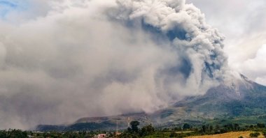 Mount Sinabung erupts, spewing a massive column of smoke and ash as seen from Karo, North Sumatra, Indonesia, July 28, 2021. (AFP Photo)