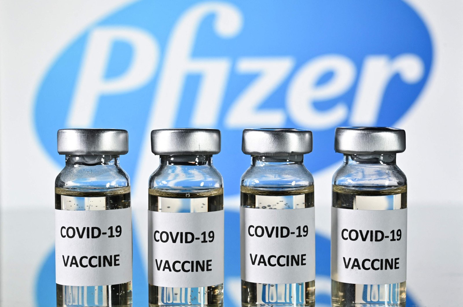 Vials with COVID-19 vaccine stickers attached, with the logo of the American pharmaceutical company Pfizer, on Nov. 17, 2020. (AFP Photo)