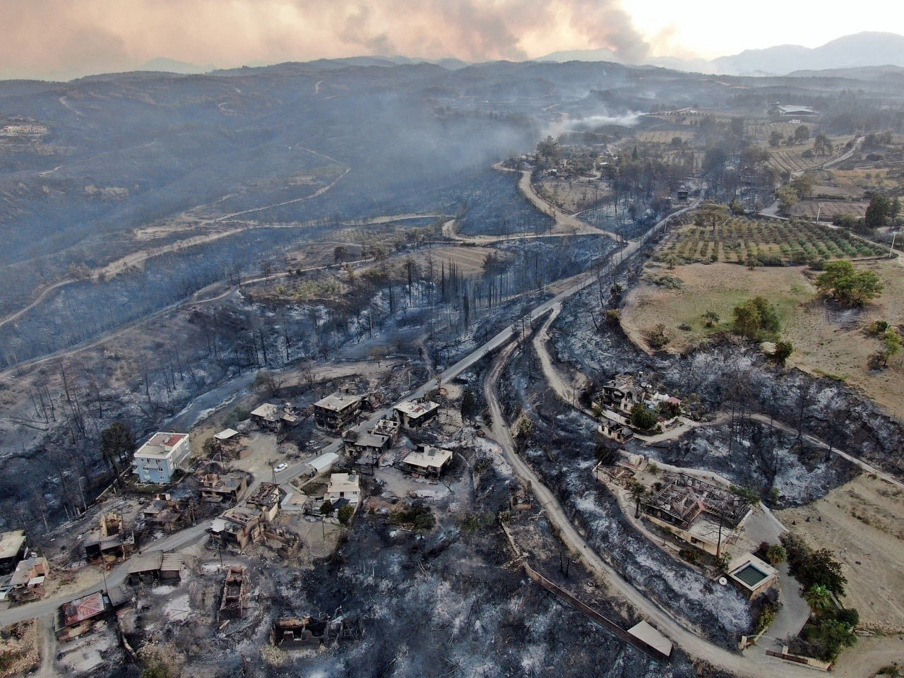 An aerial view of a residential area devastated by forest fire, in Manavgat district, in Antalya, southern Turkey, July 29, 2021. (İHA PHOTO) 