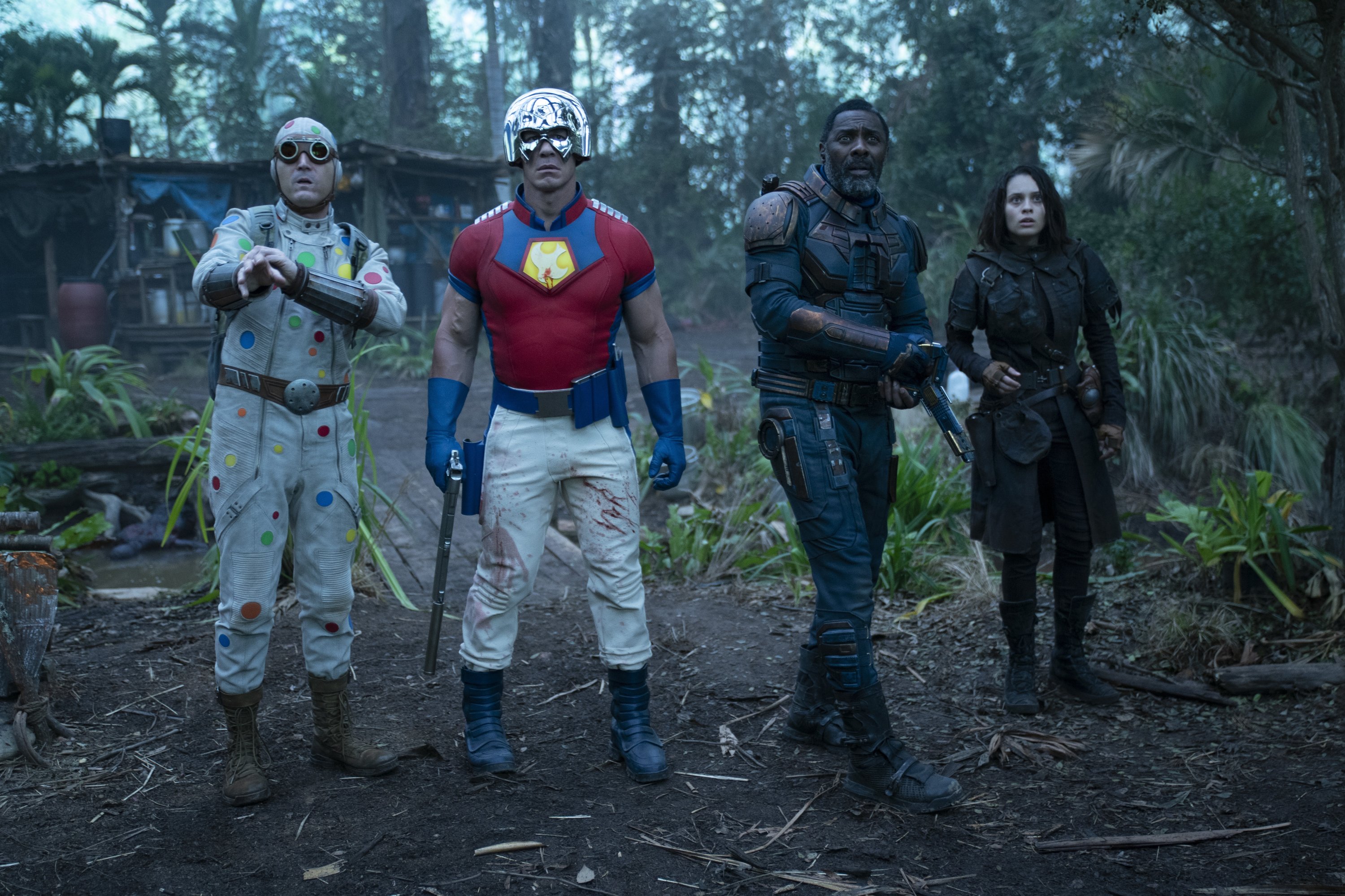This image provided by Warner Bros. Pictures shows, from left, David Dastmalchian, John Cena, Idris Elba and Daniela Melchior in a scene from "The Suicide Squad." (Jessica Miglio/Warner Bros. Pictures via AP)