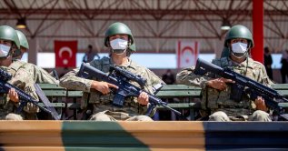 Soldiers take part in a military parade in the Turkish Republic of Northern Cyprus on July 20, 2021. (AFP Photo)