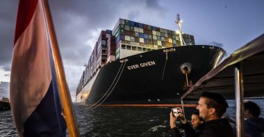 The container ship Ever Given arrives at the ECT (Europe Container Terminals) Delta terminal in the port of Rotterdam, early on 29 July 2021. (AFP Photo)