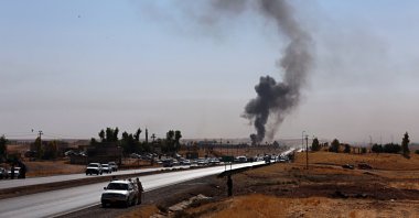 Smoke rises while in Alton Kupri, outskirts of Irbil, Iraq, Oct. 20, 2017. (AP Photo)