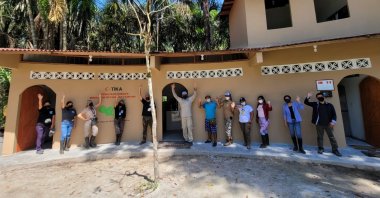 The staff pose in front of the clinic built by TİKA, in Iquitos, Peru, July 28, 2021. (AA PHOTO) 
