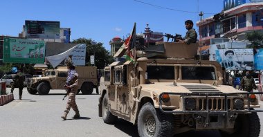 Afghan security forces sit in a Humvee vehicle amid ongoing fighting between Taliban militants and Afghan security forces in Kunduz, Afghanistan, on May 19, 2020. (AFP Photo)