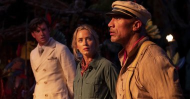 This image released by Disney shows, from left, Jack Whitehall, Emily Blunt and Dwayne Johnson in a scene from "Jungle Cruise." (Disney via AP)