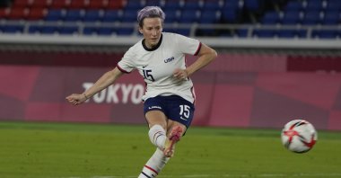 United States' Megan Rapinoe scores the winning goal against the Netherlands in a penalty shootout during a women's quarterfinal soccer match at the 2020 Summer Olympics, Yokohama, Japan, July 30, 2021. (AP Photo)