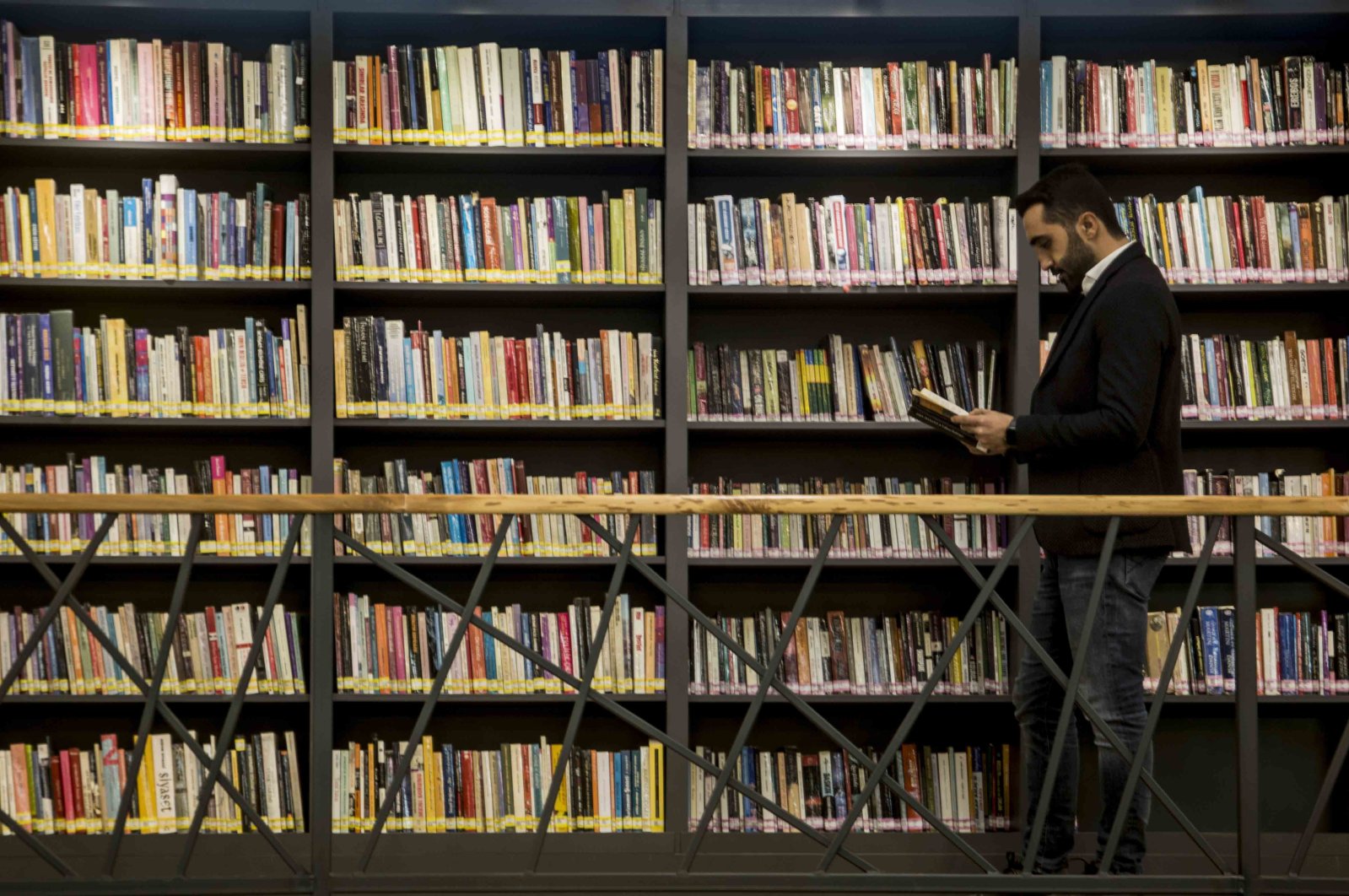 A man is seen at a public library in the southeastern province of Batman, Turkey, Nov. 11, 2020. (Photo by Orhan Kartal)