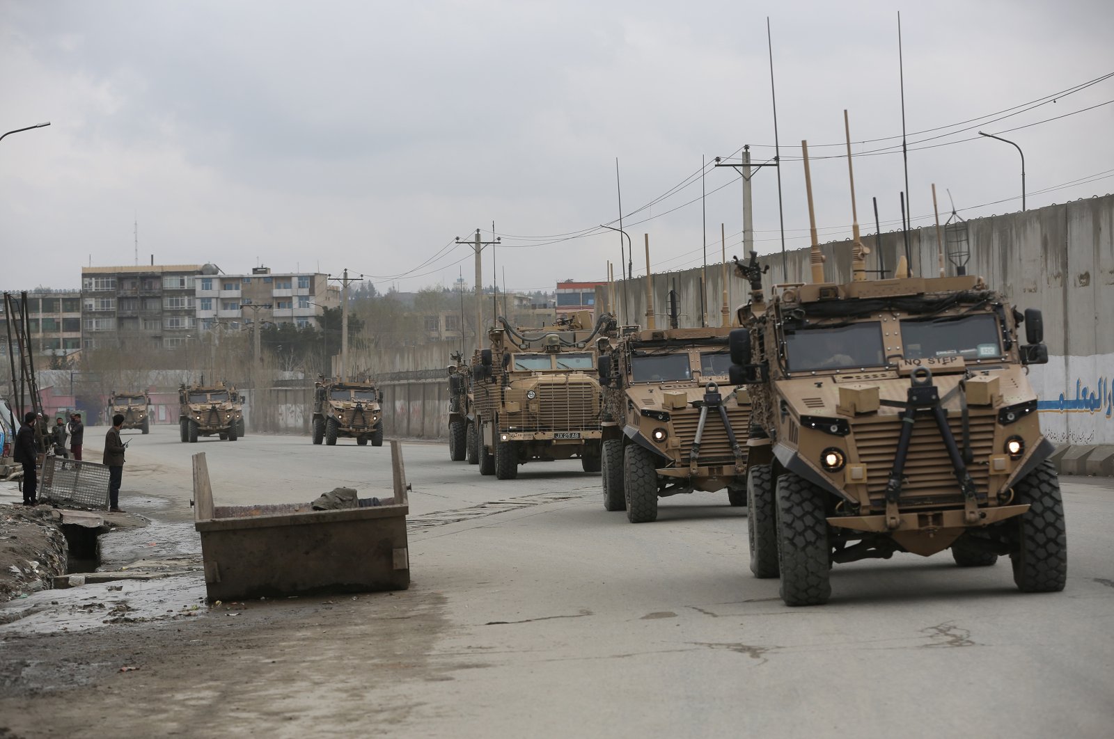British troops with NATO-led Resolute Support Mission forces travel, in Kabul, Afghanistan. March 25, 2020. (AP Photo)