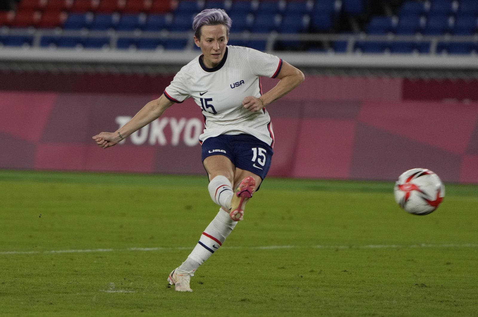 United States' Megan Rapinoe scores the winning goal against the Netherlands in a penalty shootout during a women's quarterfinal soccer match at the 2020 Summer Olympics, Yokohama, Japan, July 30, 2021. (AP Photo)