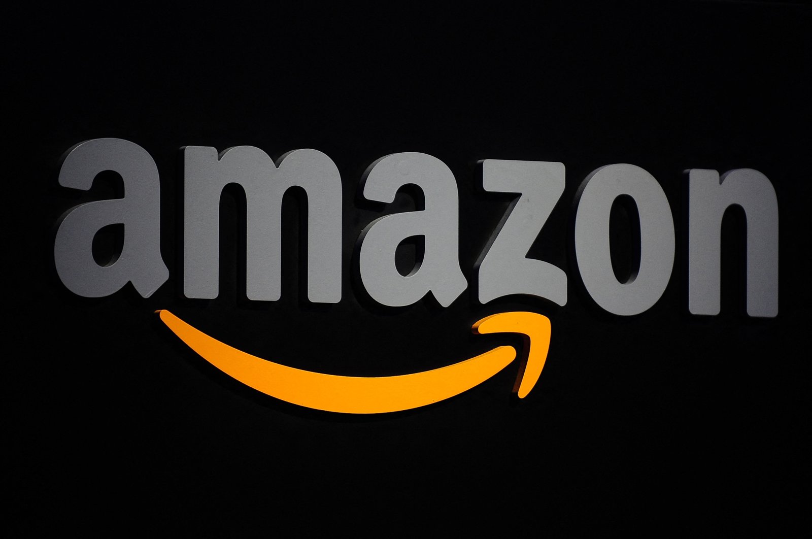 The Amazon logo is seen on a podium during a press conference in New York, the US, Sept. 28, 2011. (AFP Photo)