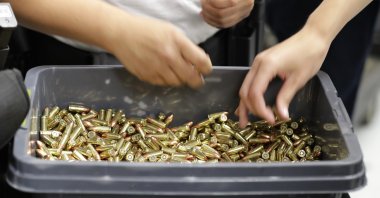 Officers taking part in training load gun clips with ammunition at the Washington State Criminal Justice Training Commission in Burien, Washington, U.S., July 16, 2019. (AP Photo)