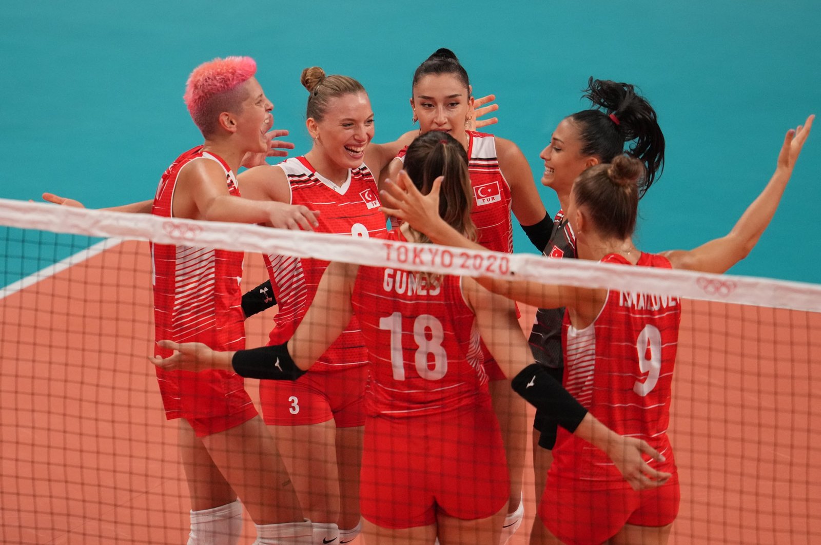 The Turkish National Women's Volleyball Team celebrates after defeating Argentina 3-0 to reach the quarterfinals at the Tokyo 2020 Olympic Games, Tokyo, Japan, July 31, 2021. (AA Photo)