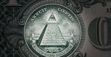 The Eye of Providence, a symbol of Freemasonry, can be seen on the $1 bill accompanied with the phrase "Novus ordo seclorum" (New world order). (Shutterstock Photo)