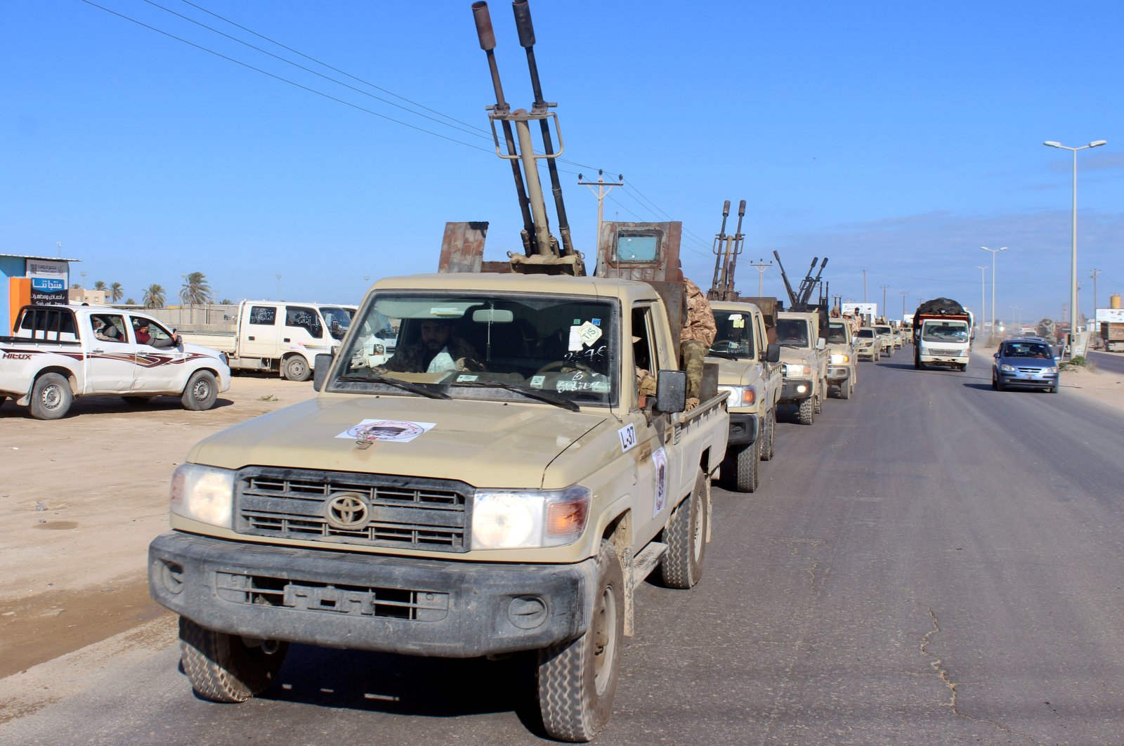 Military vehicles belonging to the internationally recognized Libyan government head out to the front line from Misrata, Libya, Feb. 3, 2020. (Reuters Photo)