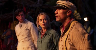 Jack Whitehall (L), Emily Blunt and Dwayne Johnson appear in a scene from "Jungle Cruise." (Disney via AP)