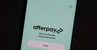 The Afterpay app is seen on the screen of a mobile phone in a picture illustration taken on Aug. 2, 2021. (Reuters Photo)