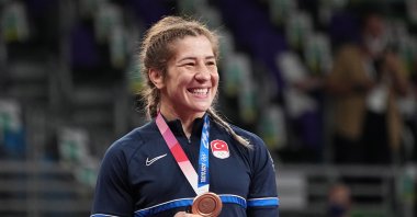 Bronze medalist Yasemin Adar of Turkey poses on the podium during the medal ceremony for the Women's Freestyle 76kg Wrestling final of the Tokyo 2020 Olympic Games at the Makuhari Messe convention centre in Chiba, Japan, 02 August 2021. (EPA Photo)